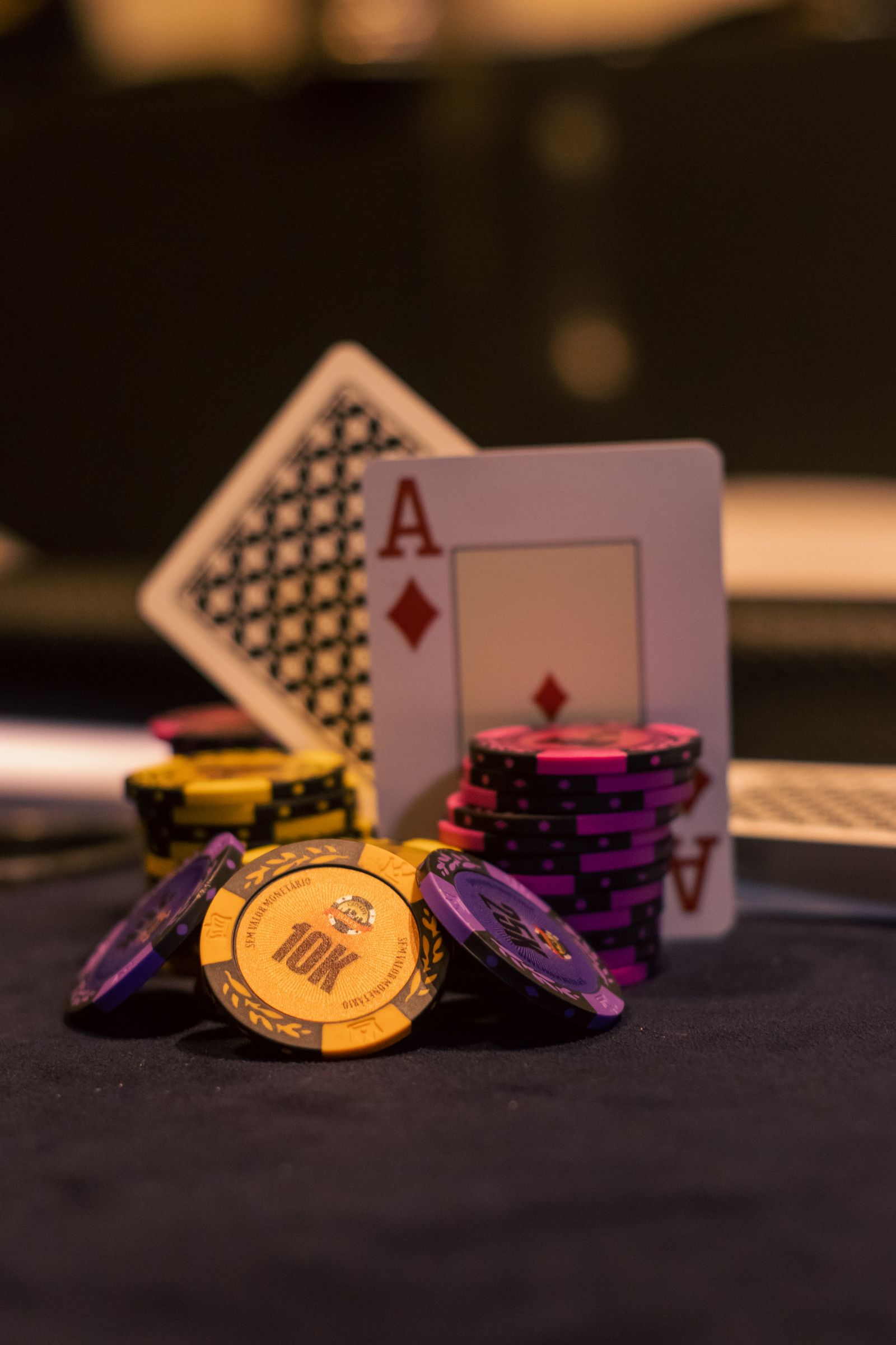 Casino chips and playing cards prepared for a table game